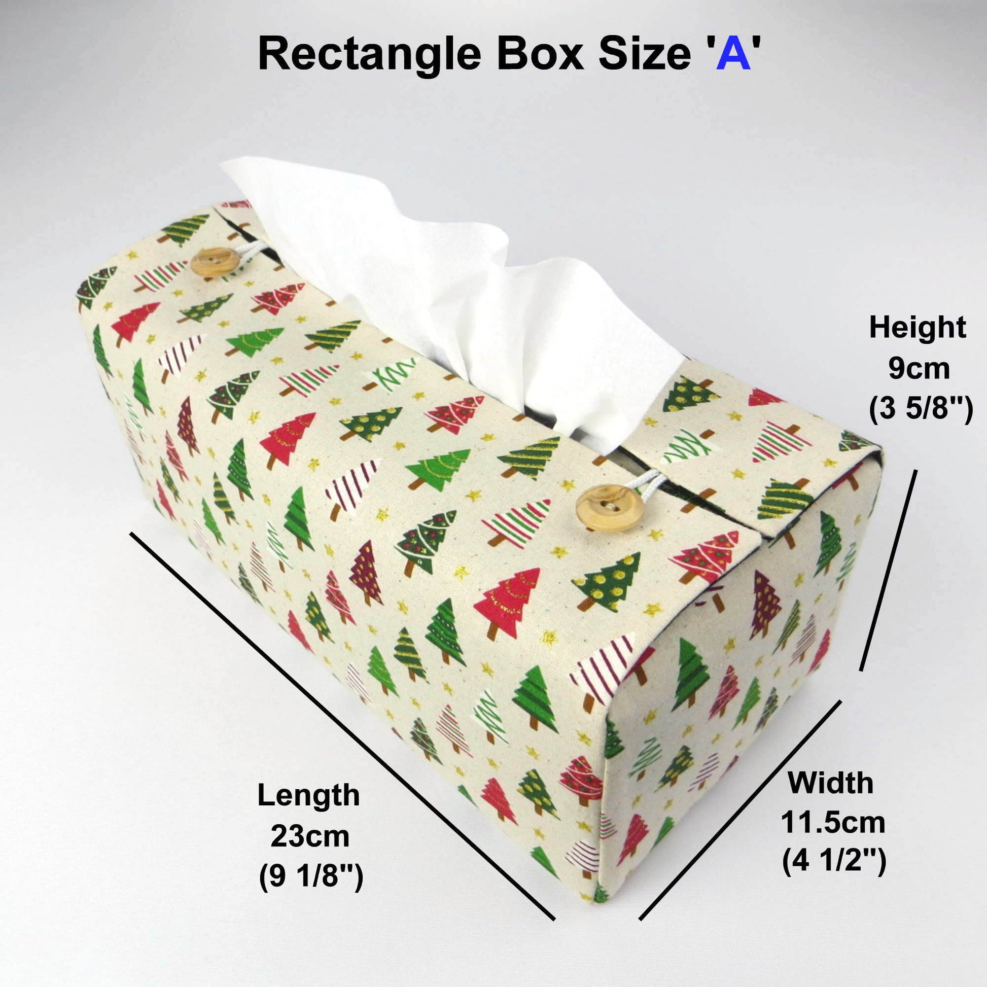 Rectangular tissue box cover with holiday themed multi colour decorated Christmas trees design on beige background