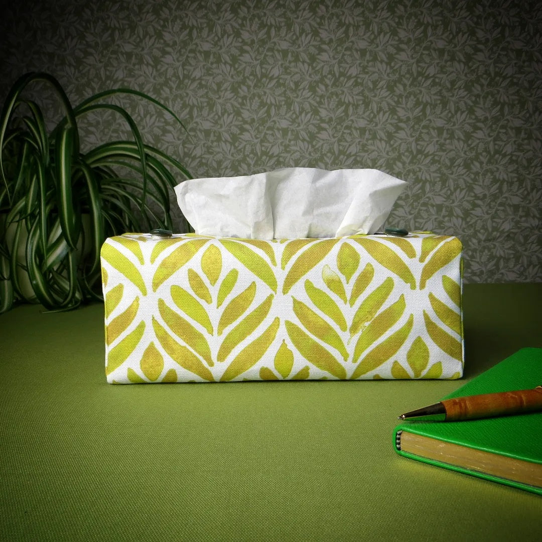 Rectangle tissue box cover with yellow watercolour style leaf pattern on white background