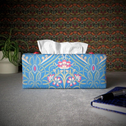 Rectangular tissue box cover with red flowers with green Victorian embellishment on blue background